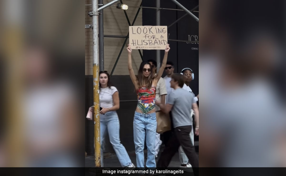 Woman Sick Of Dating Apps Hits US Streets With Cardboard “Looking For Husband” Sign
