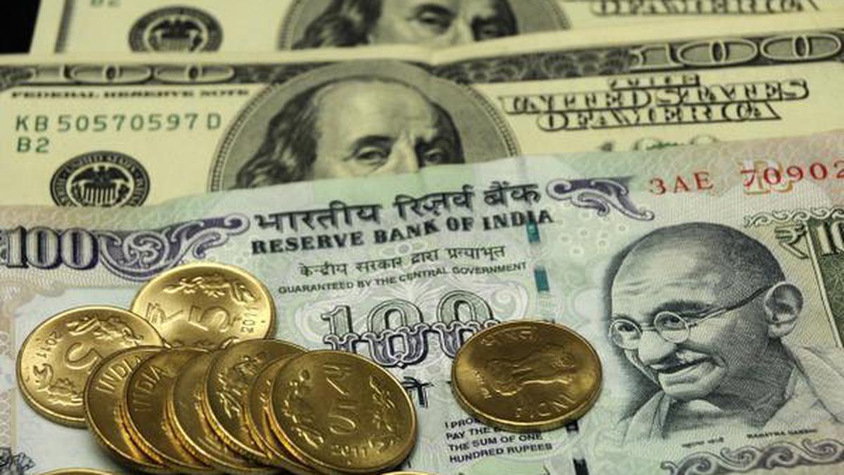 Rupee falls eight paise to settle at 83.06 against U.S. dollar