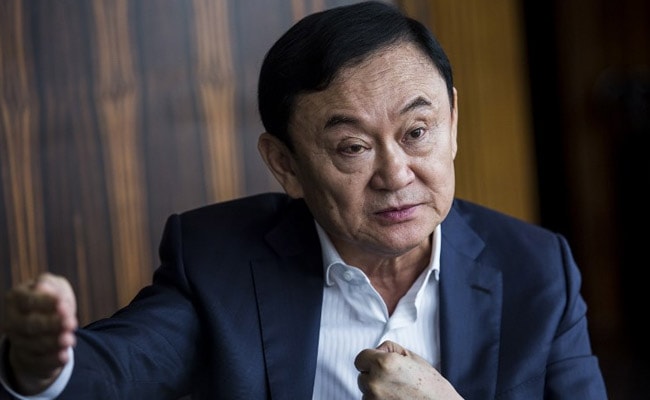 Thai King Cuts Ex-PM Thaksin’s Jail Term To One Year