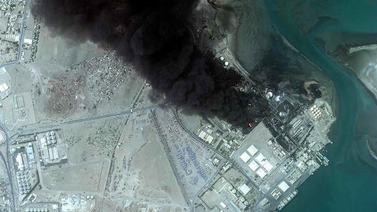 Yemeni port still burning days after Israeli air strikes