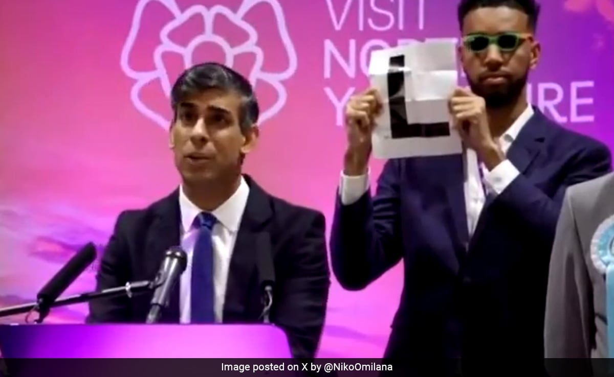 Rishi Sunak Lost Big. YouTuber Niko Omilana Mocked Him With A Giant “L” Sign Behind Him