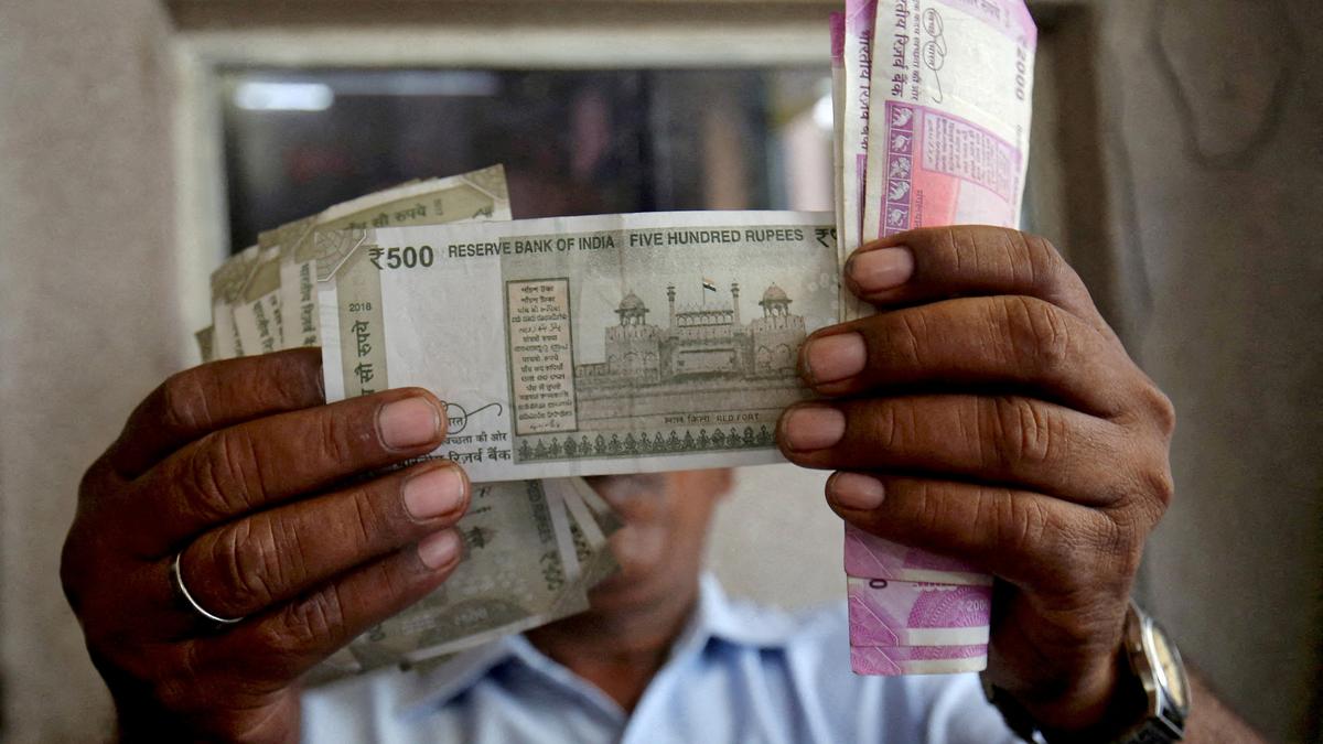 Rupee rises 10 paise to close at 83.87 against U.S. dollar