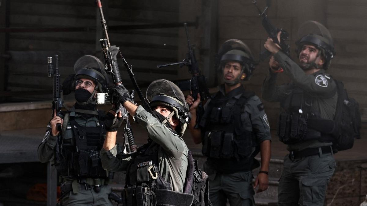 Hamas in Gaza fire barrage of rockets into Israel as mourners mark October 7