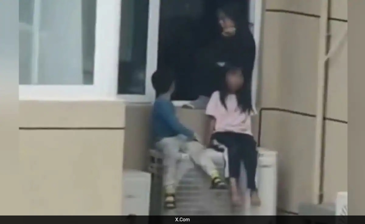 Chinese Woman Risks Children’s Lives On 23rd-Floor AC Unit To Upset Husband During Argument