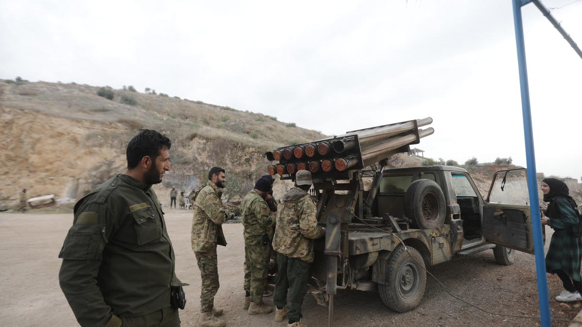 Syrian army says it has withdrawn from the city of Hama after insurgents broke through its defenses