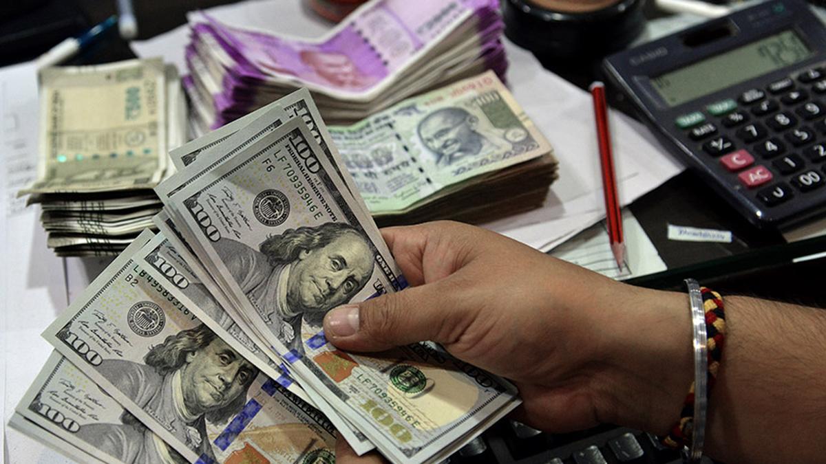 Rupee settles on a flat note near all-time low at 84.85 against U.S. dollar