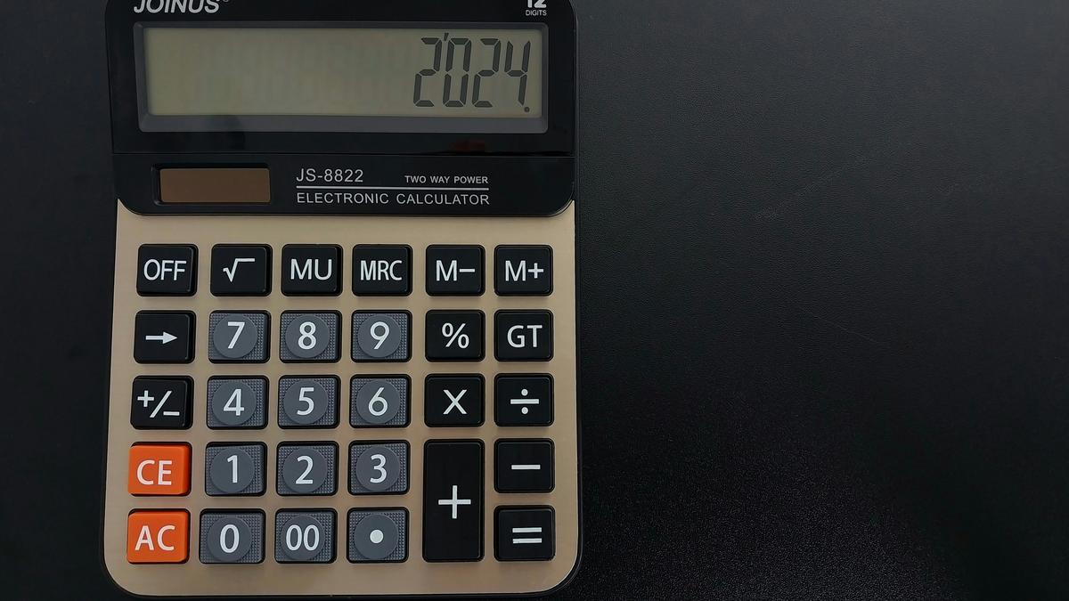 Why are numbers arranged differently on keypads and calculators?