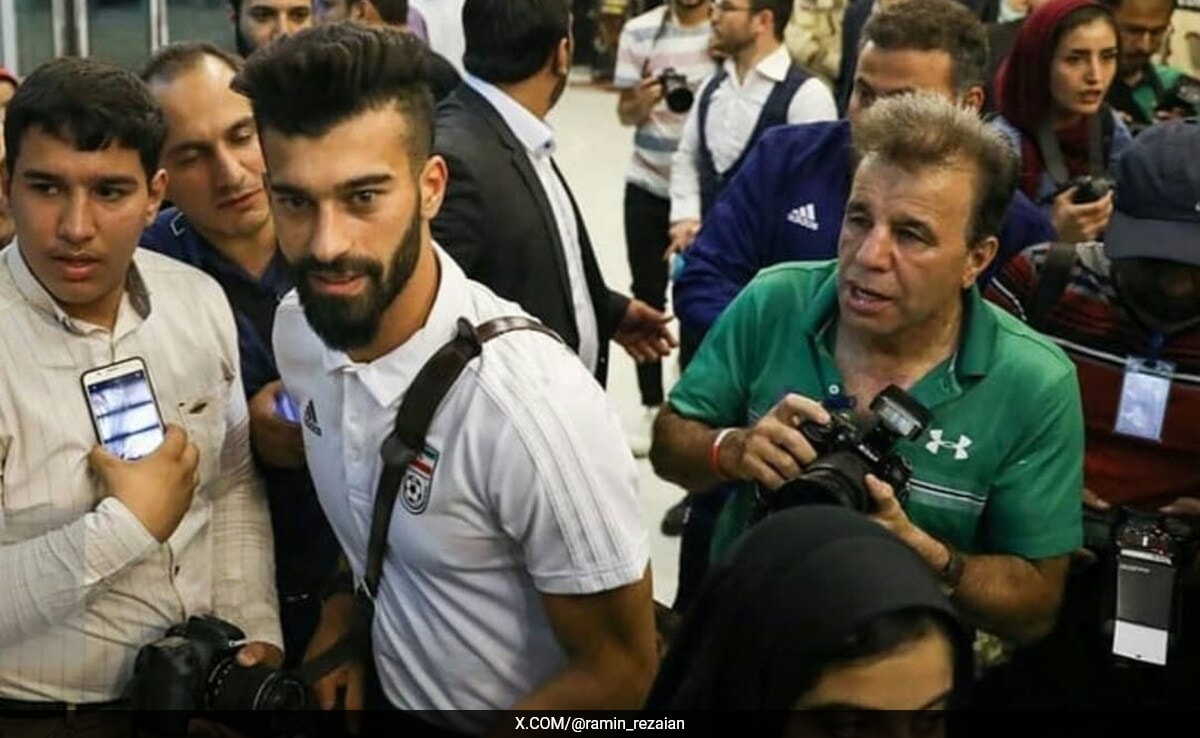 Iranian Footballer Faces Questioning Over Controversial ‘Hug’ With Female Fan