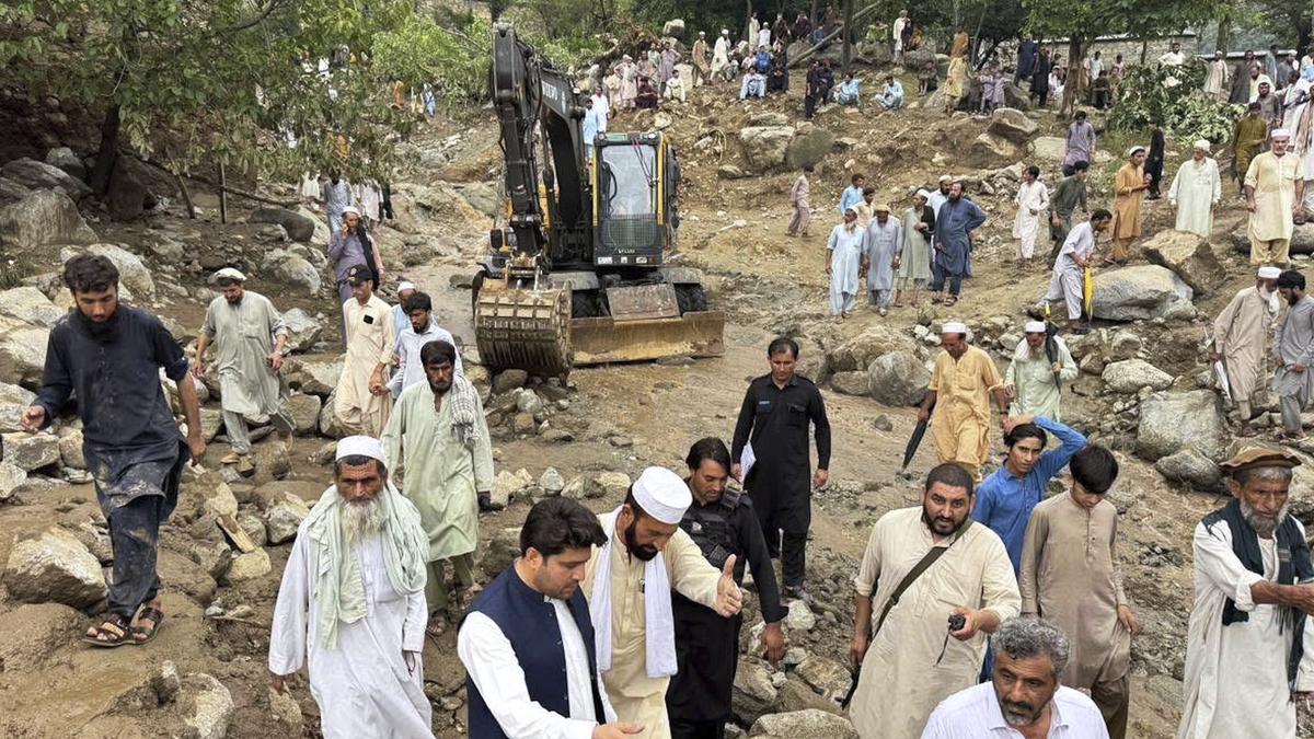 Flash floods triggered by heavy rains kill at least 49 people in northwestern Pakistan