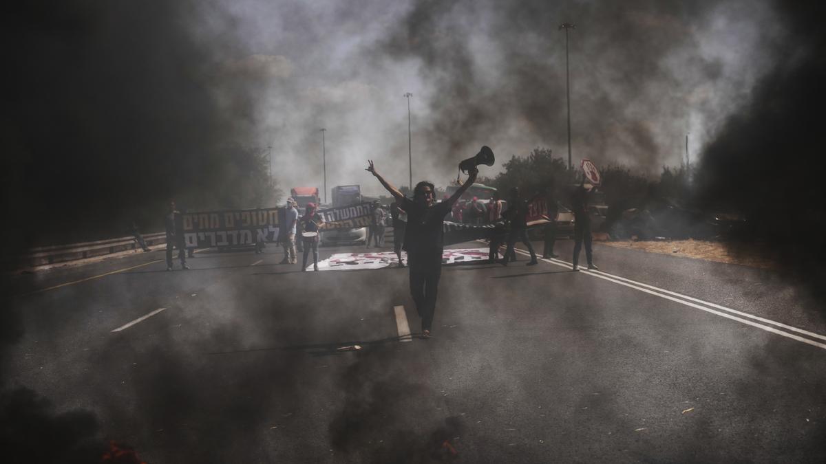 Protesters in Israel demand release of hostages as Israeli strikes kill 16 in Gaza, hospitals say