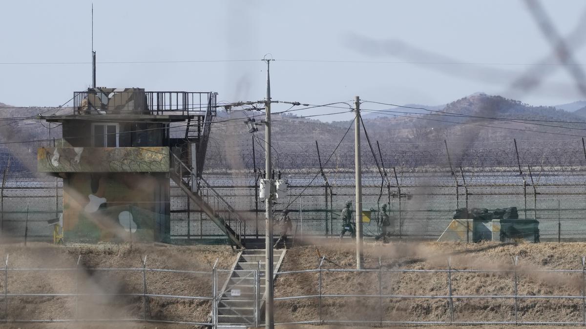 North Korea says South Korea fired warning shots at its soldiers; Seoul says troops crossed border
