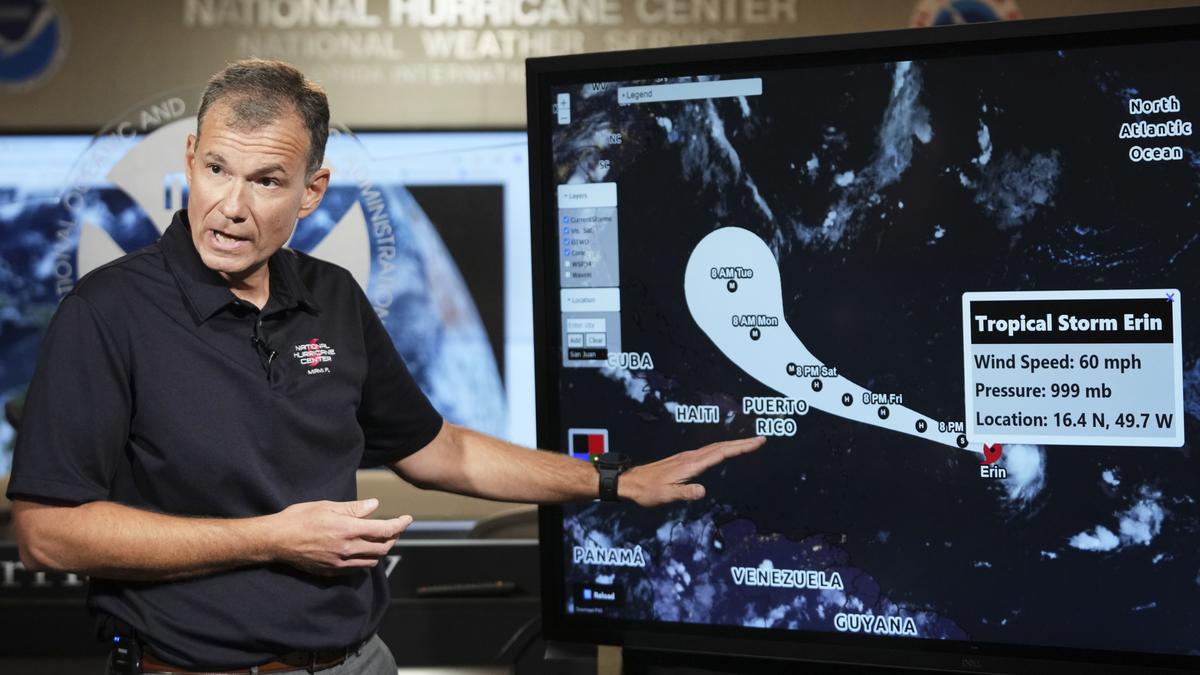 Hurricane Erin intensifies offshore, lashes Caribbean with rain