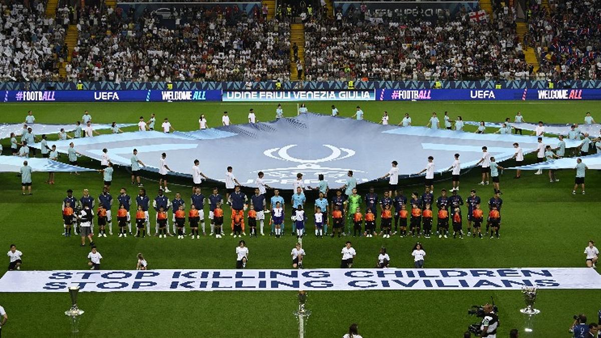 UEFA rolls out banner in support of children in war zones ahead of Super Cup