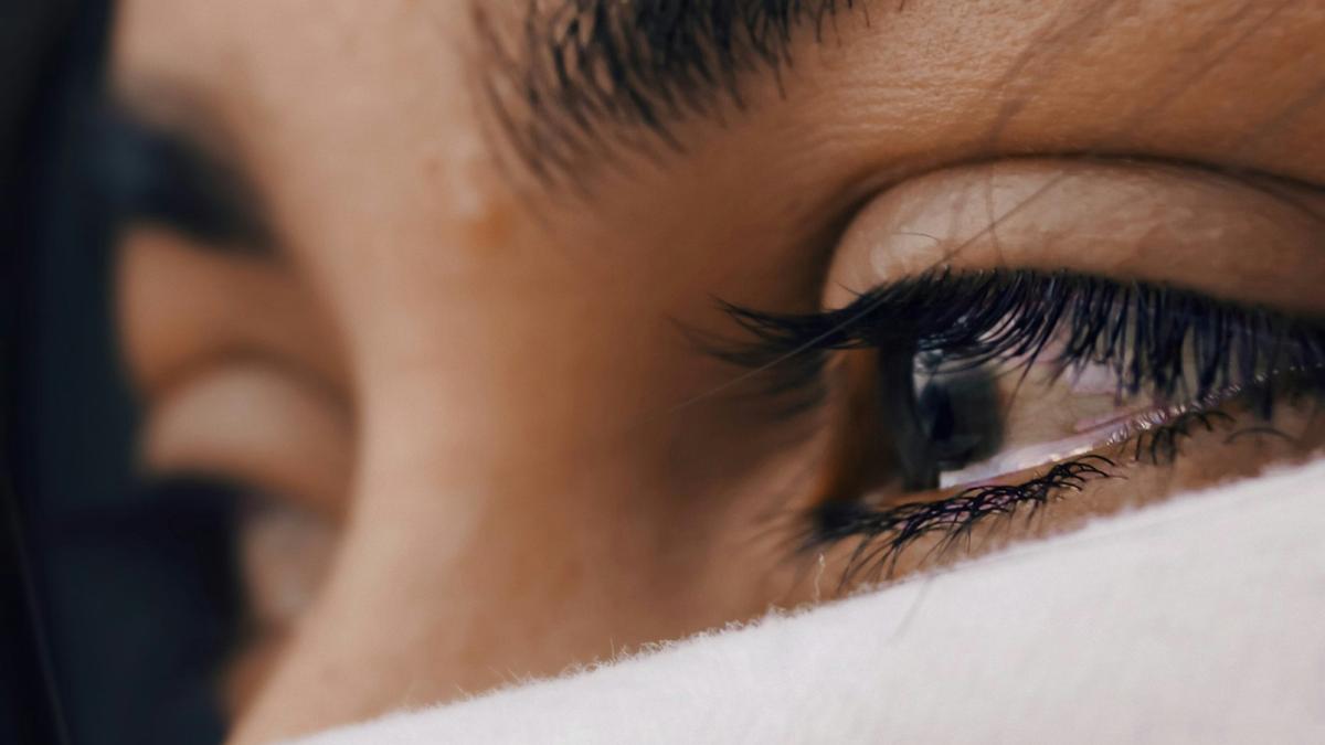 Why does sadness cause us to shed tears?