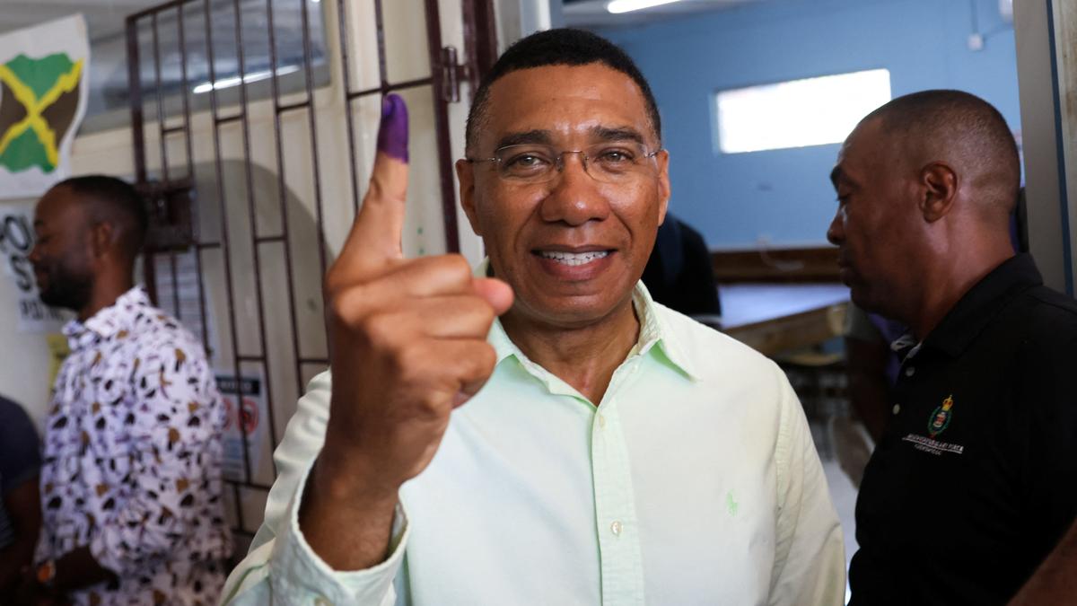 Jamaican Prime Minister Andrew Holness elected to a third term as main Opposition candidate concedes