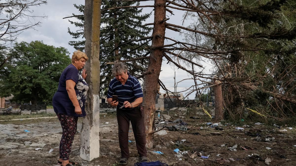 Russian glide bomb attack in eastern Ukraine kills at least 21 people in line to receive pensions