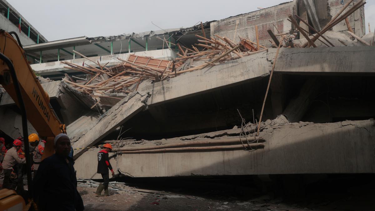 Islamic school building collapses in Indonesia, at least 65 students presumed buried under rubble