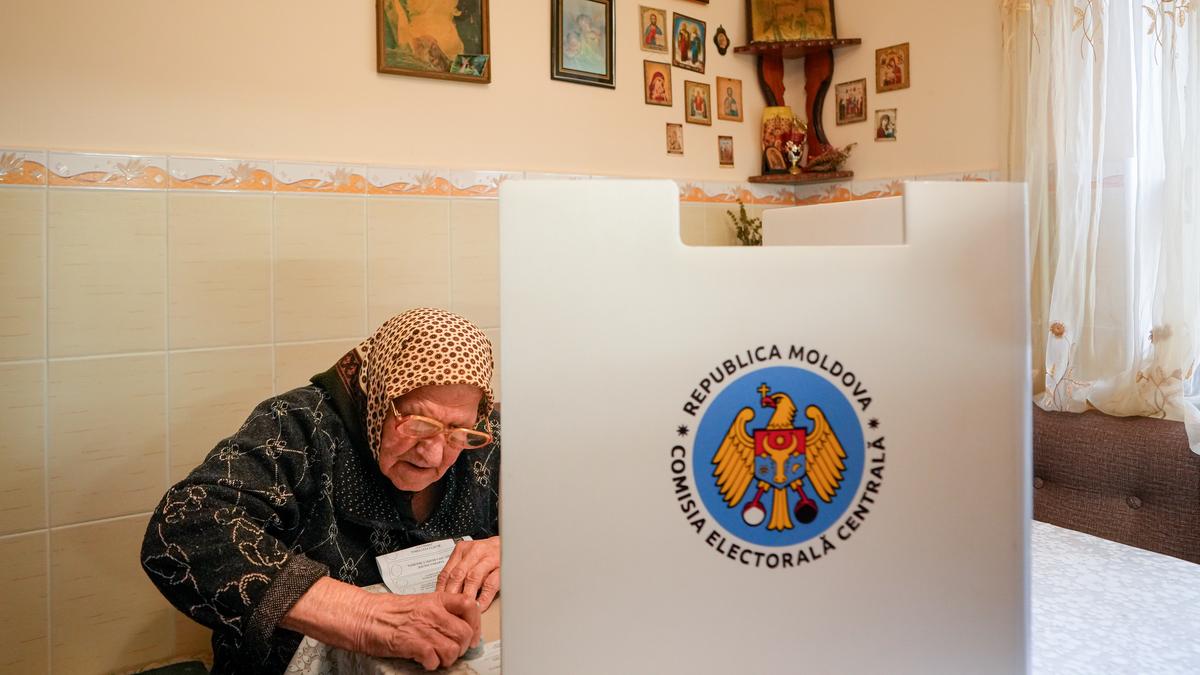 Moldovans cast ballots in a tense election plagued by Russian interference claims