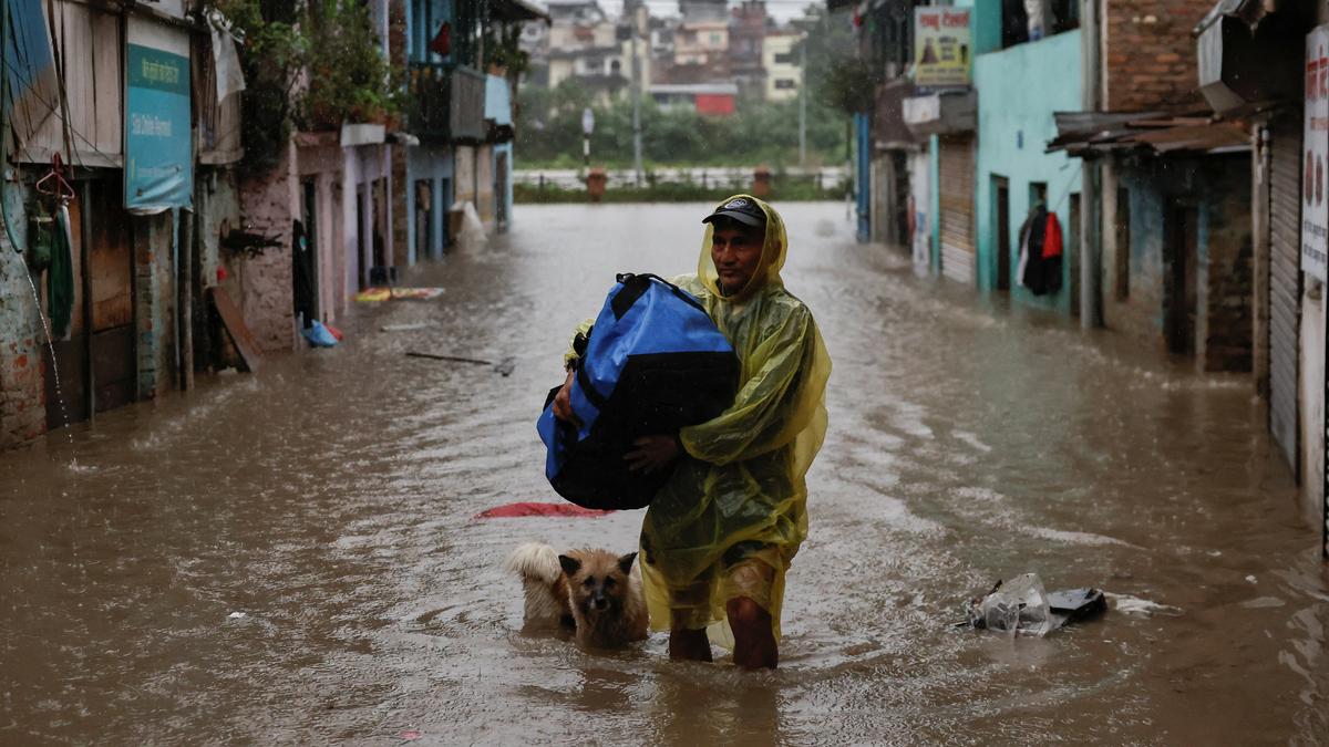 Heavy rains kill at least 22 in Nepal, block roads