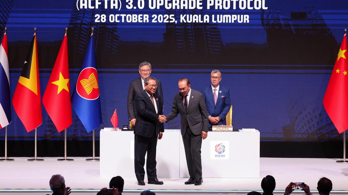 China and ASEAN, hit by U.S. tariffs, sign upgraded free trade pact