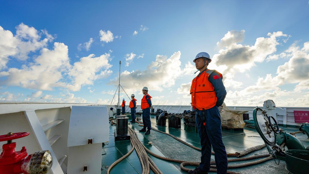 China’s coast guard holds National Day celebrations at disputed shoal claimed by Philippines