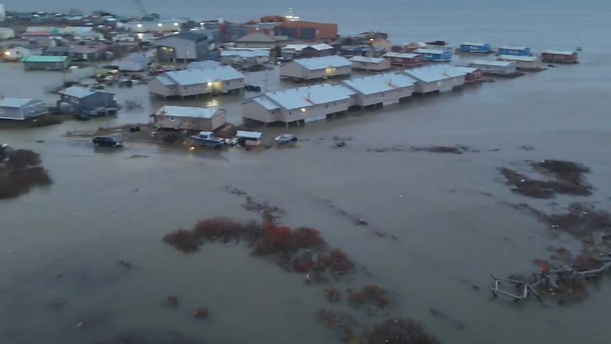Three missing and dozens rescued after remnants of a typhoon lash western Alaska