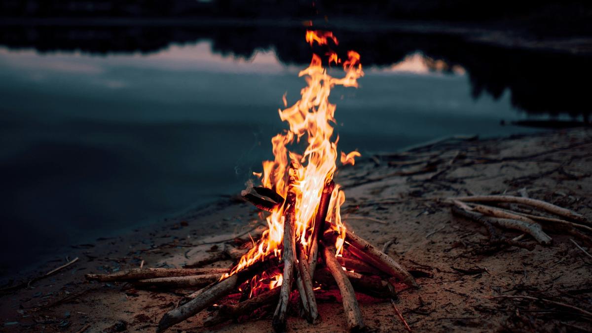 Why does smoke from a stove or hearth irritate the eyes?