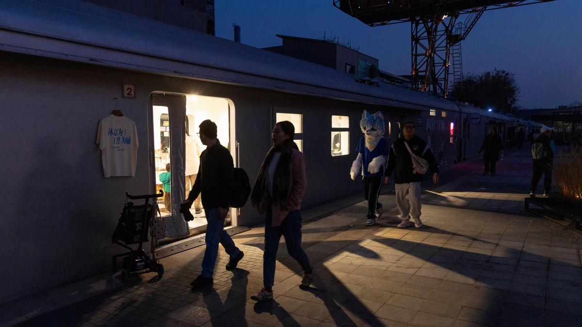 Train hits railway workers killing 11 in China