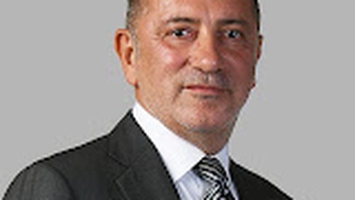 Prominent Turkish journalist gets 4-year sentence for Erdogan comments