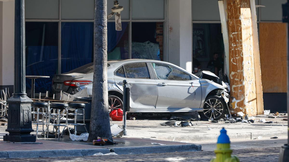 Four killed, 11 injured as car fleeing police slams into bar in Florida