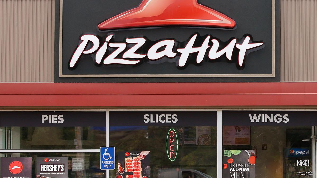 Pizza Hut’s parent company Yum Brands says it’s considering selling chain