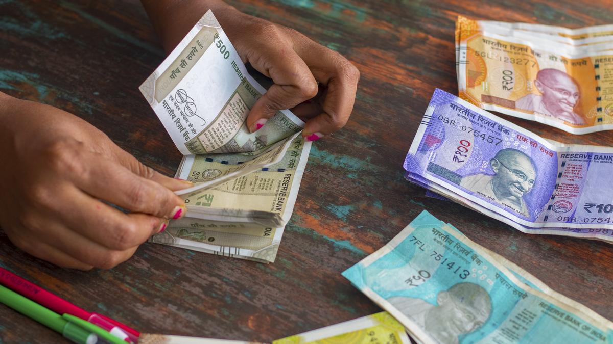 Rupee declines 4 paise to close at 90.21 against U.S. dollar