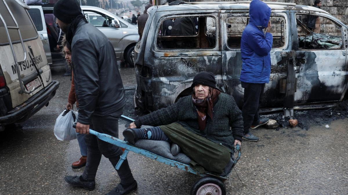 Syria urges Kurdish fighters to surrender after ramping up Aleppo operation