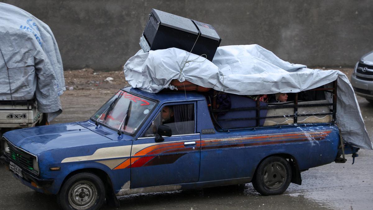 Kurdish forces withdraw from Syria’s largest oil field as government forces advance