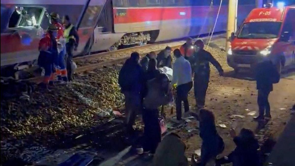 Two high-speed trains collide and derail in Spain; at least 20 killed