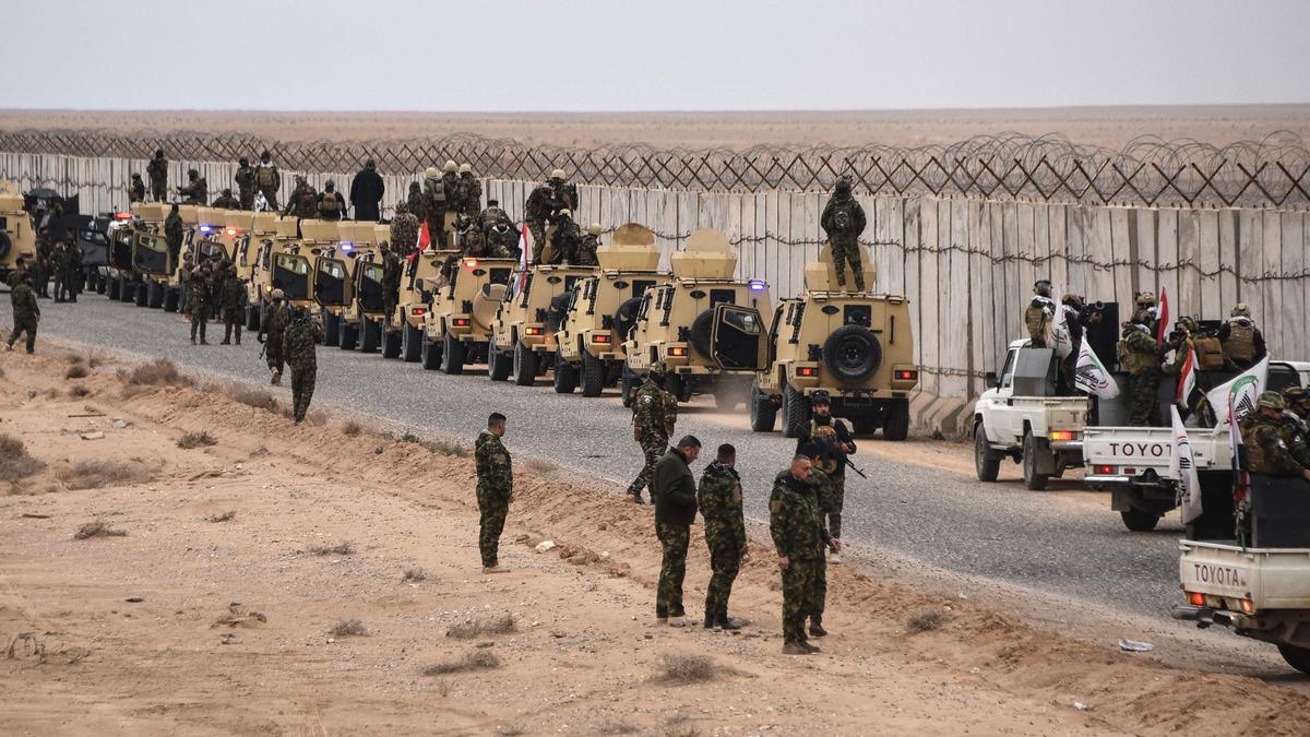 Syrian troops, Kurdish forces poised on front lines as truce deadline looms