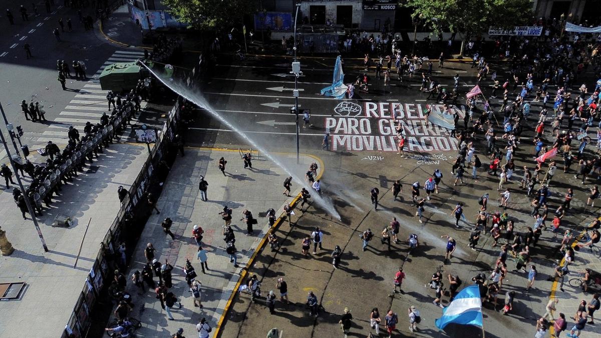 Striking Argentine workers clash with police in protest over labor reforms