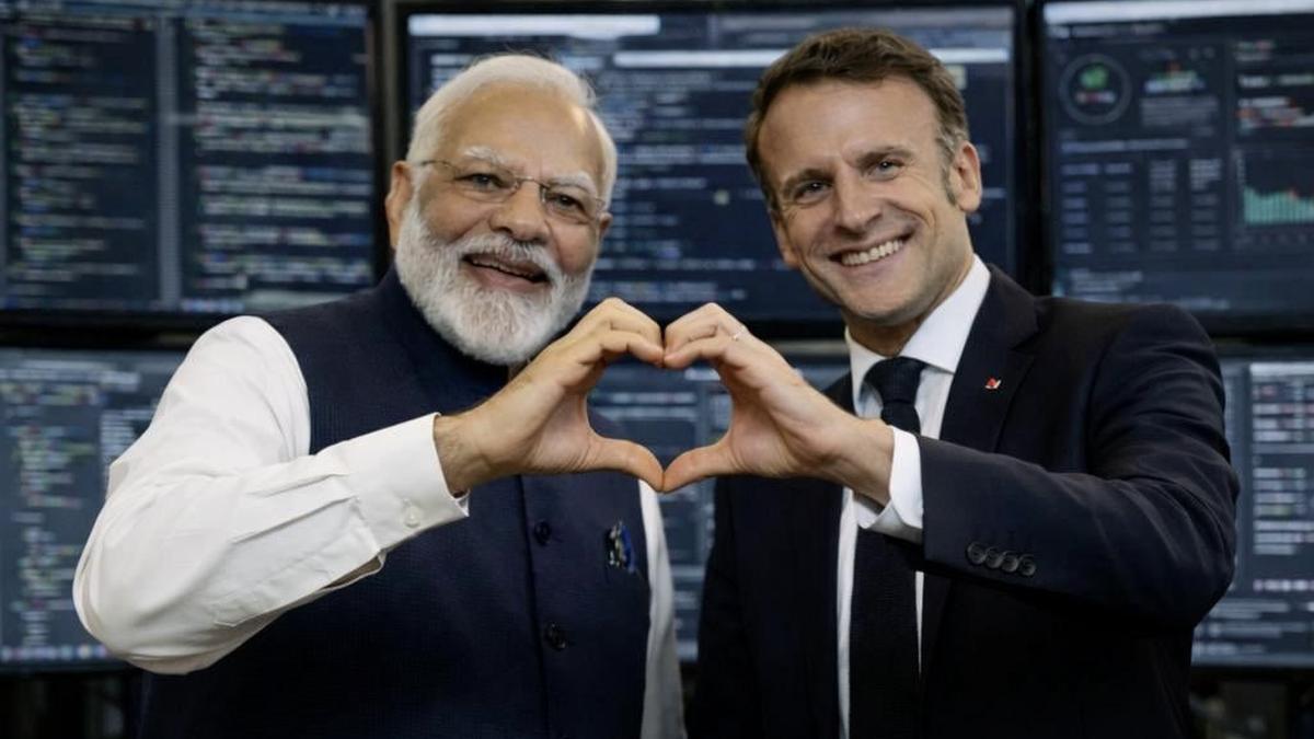 Macron shares AI-generated image featuring PM Modi with heart gesture