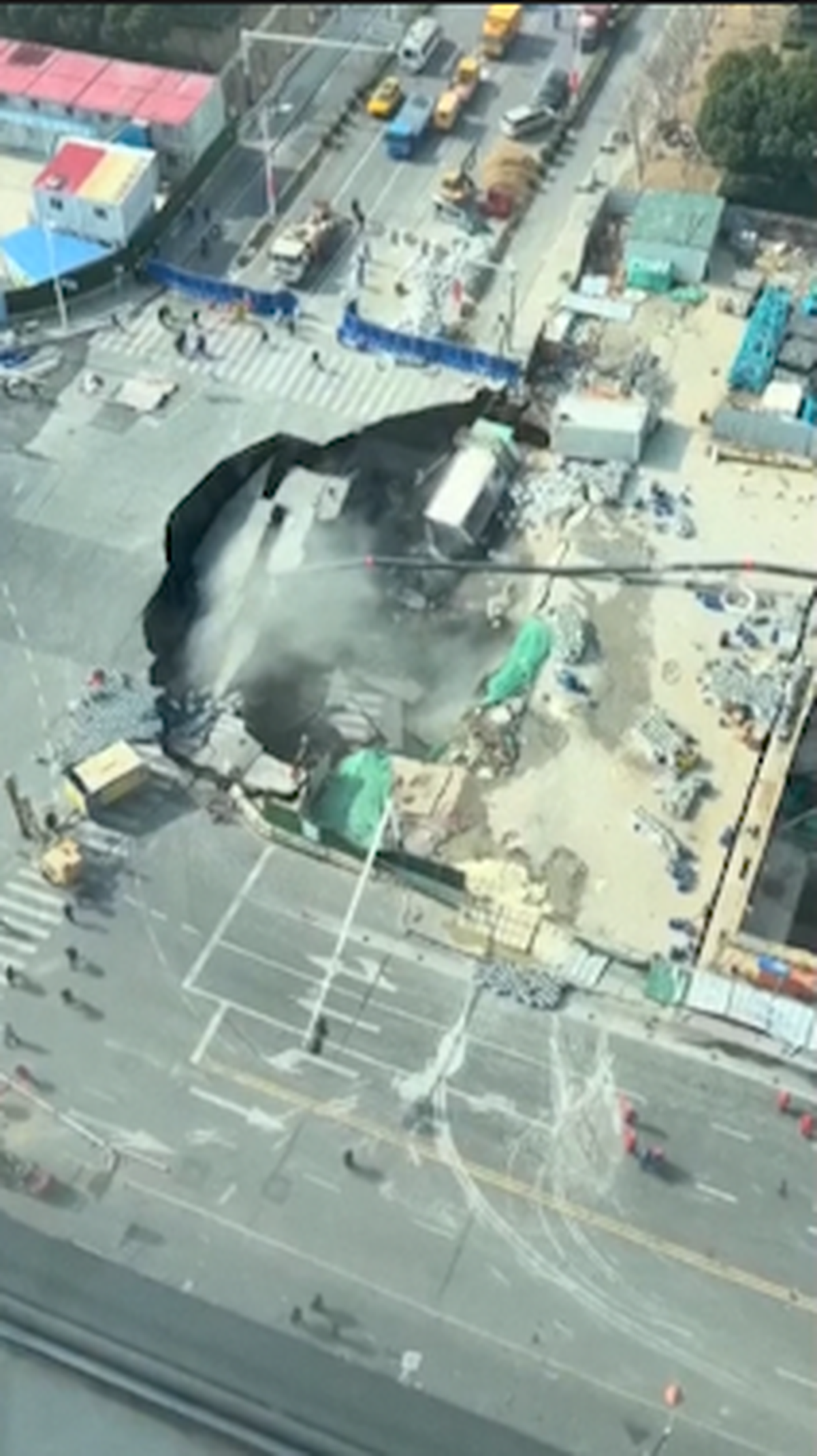 Watch: Large sinkhole appears in Shanghai during metro construction