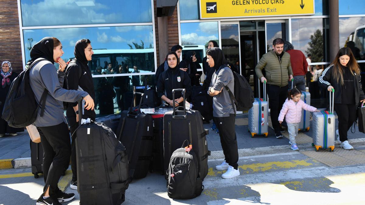 Iranian women’s soccer team arrive back in Iran after some withdrew asylum claim