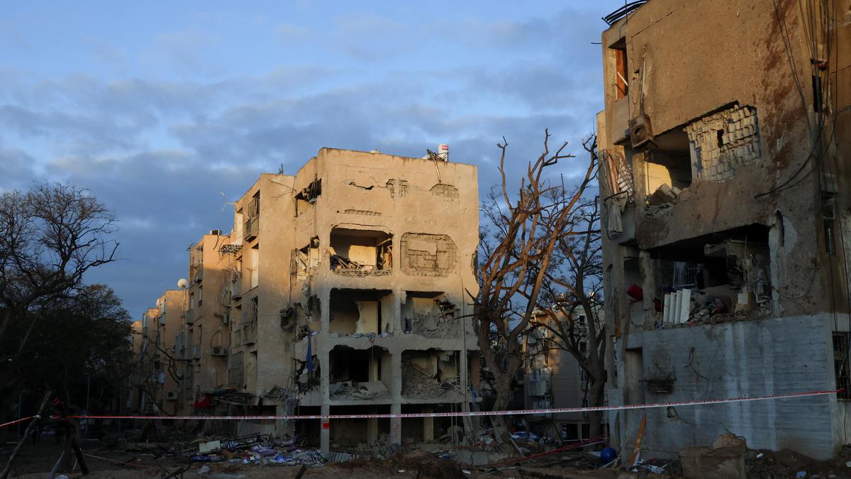 Iran strikes near Israeli nuclear research center as Trump threatens attacks on Iranian power plants