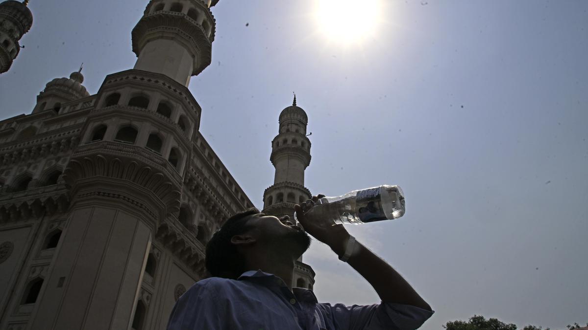 On hotter days, why does the sky seem more grey than blue?
