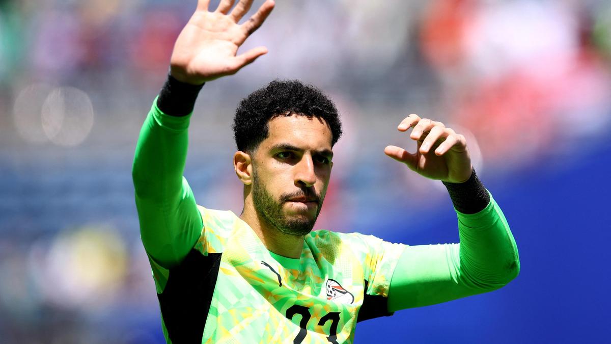 Belgium escape Egypt upset bid with own goal