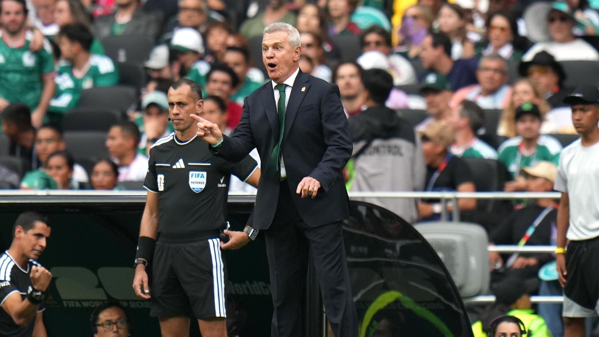 Aguirre says Mexico beat cramps and stage fright in World Cup opener