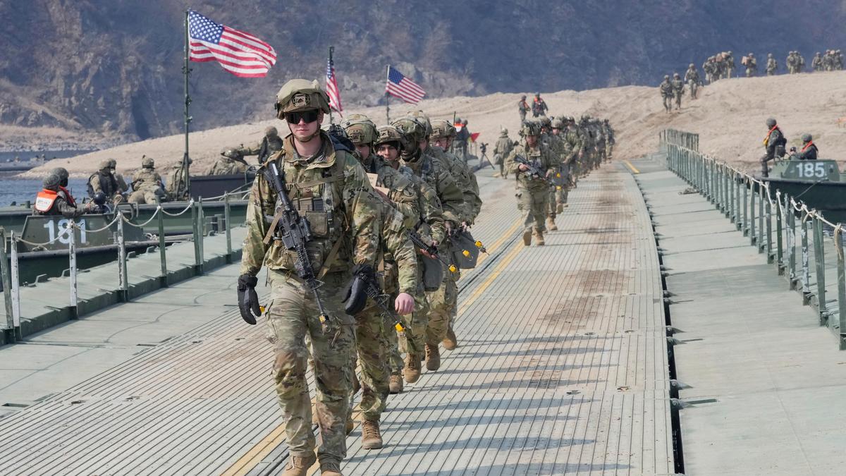 U.S. court blocks Pentagon from removing transgender troops, for now