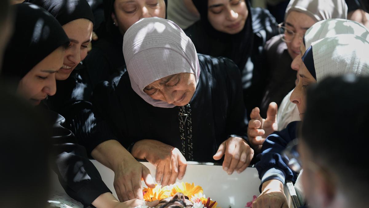 Palestinians say Israeli forces kill two during settler attack
