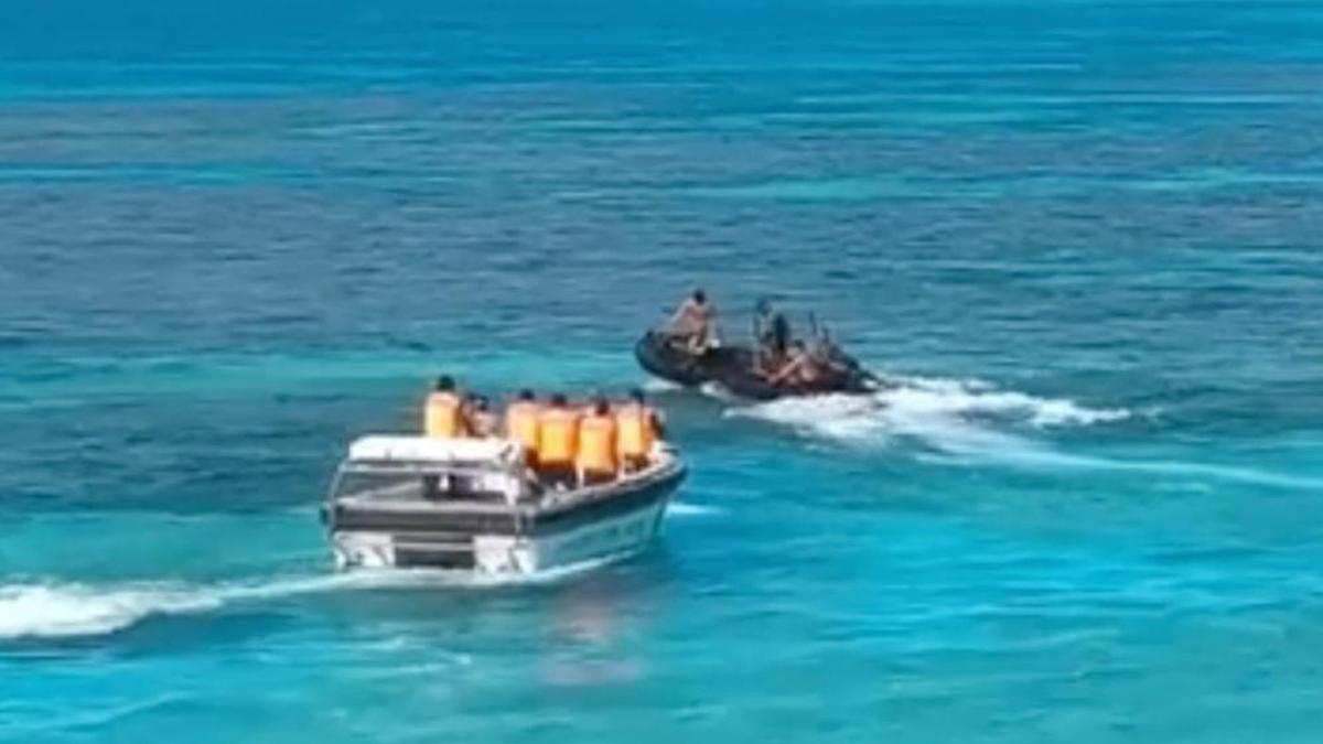 Philippines accuses Chinese coast guard of injuring Filipino sailor in disputed shoal