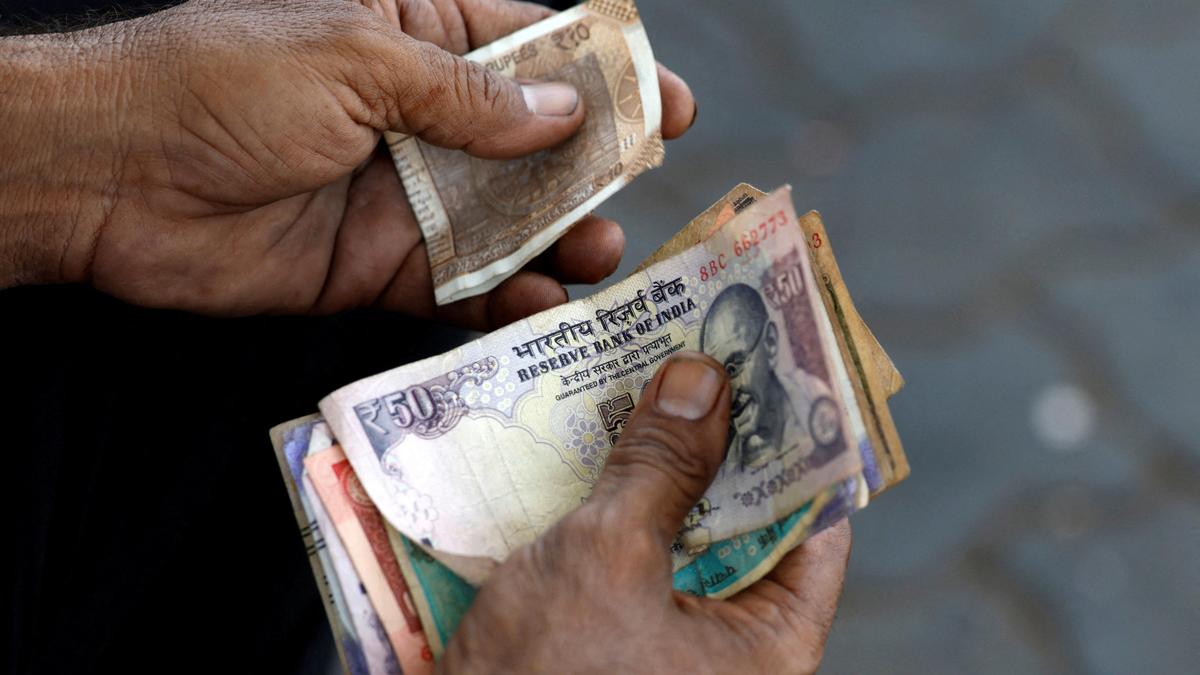 Rupee settles on flat note, up 2 paise at 95.20 against U.S. dollar