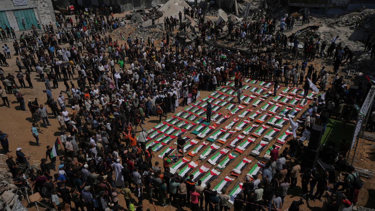 Palestinians hold mass funeral for 112 bodies finally recovered from a 2023 Gaza strike
