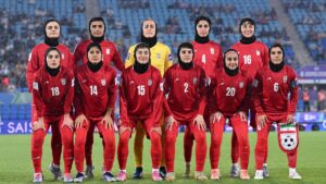 Iranian football players who sought asylum in Australia say anthem silence was protest against Tehran